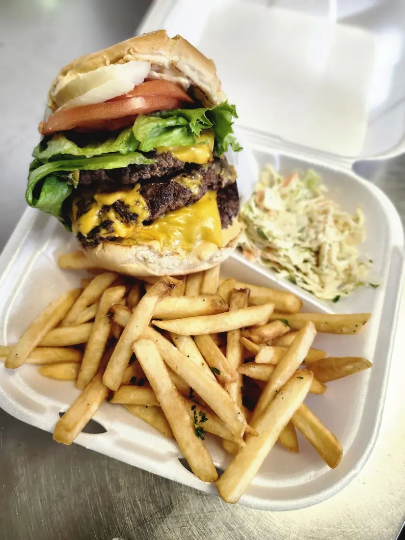 Epic Foods Triple Smash Burger with fries and slaw